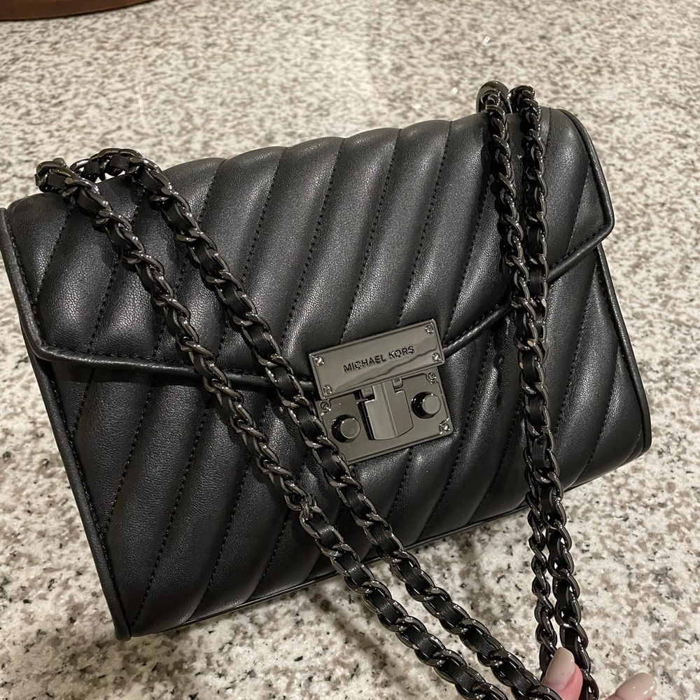New Michael Kors purse in great condition